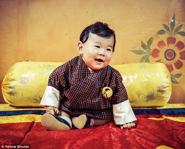 The King of Bhutan has followed in the Duchess of Cambridge's footsteps by getting behind the camera to take official portraits of his young son Prince Jigme