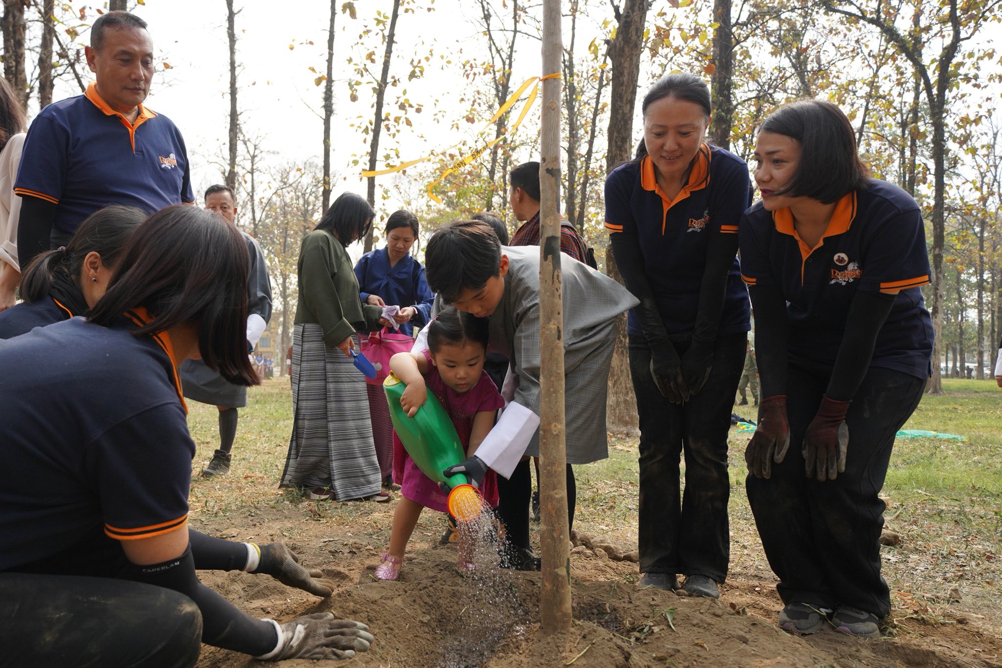 gyalsey and princess planting trees in gmc