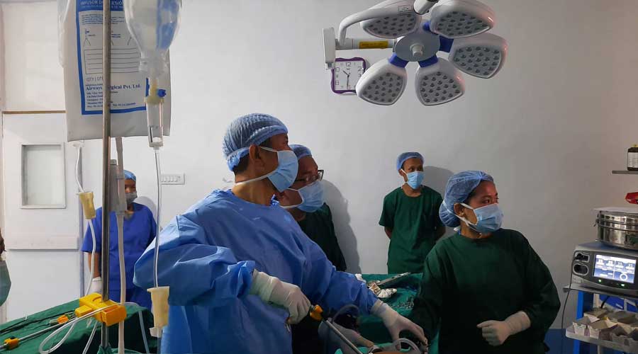 dr lotay tshering performing surgeries