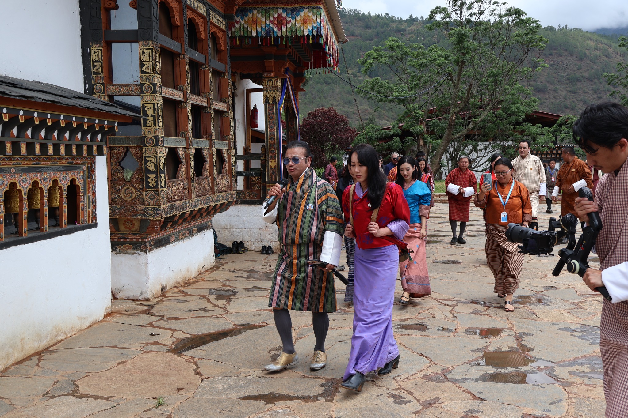 woman carrying phallus in punakha bhutan fertility festival