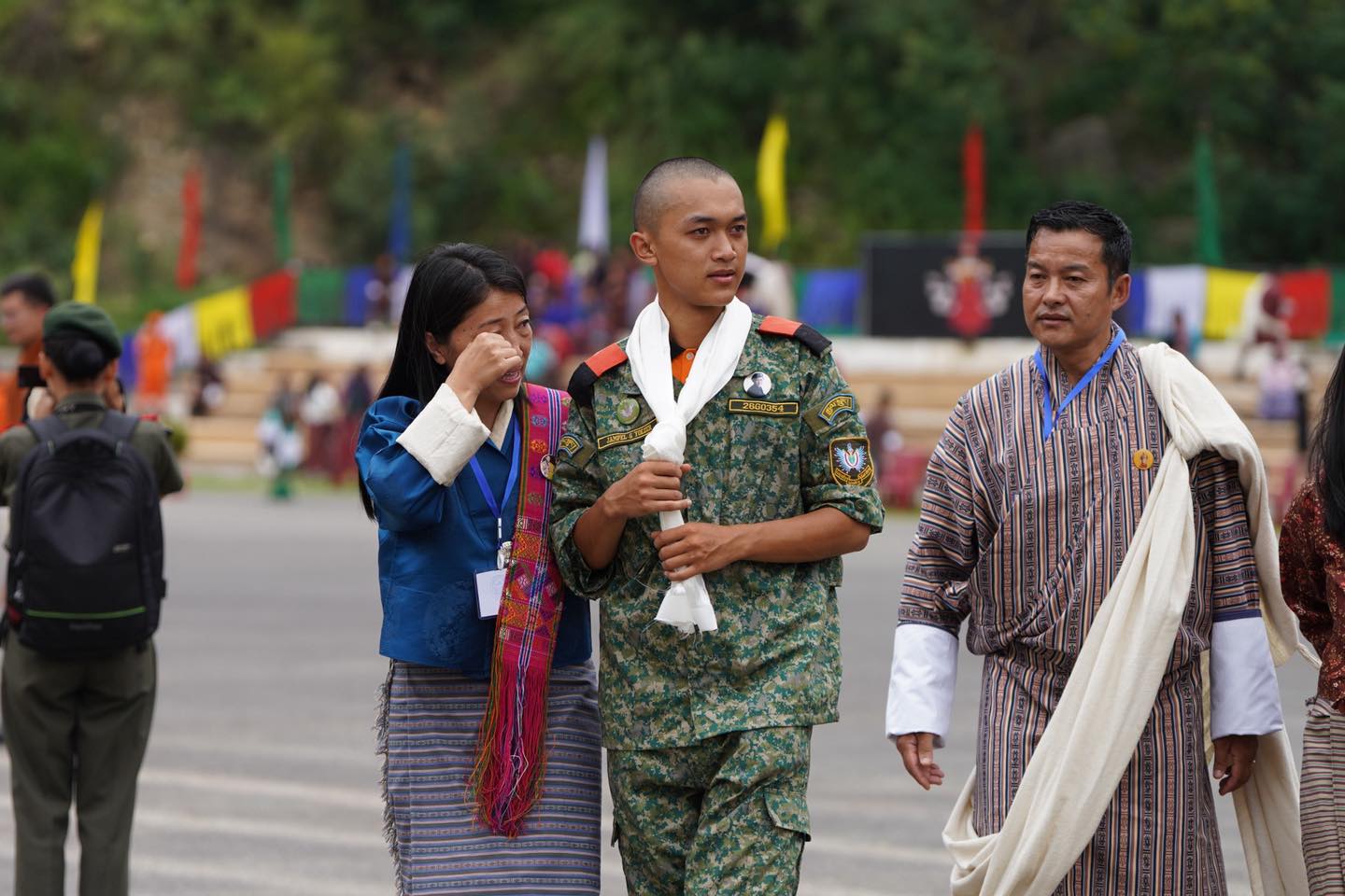 parent crying at gyalsup pop bhutan