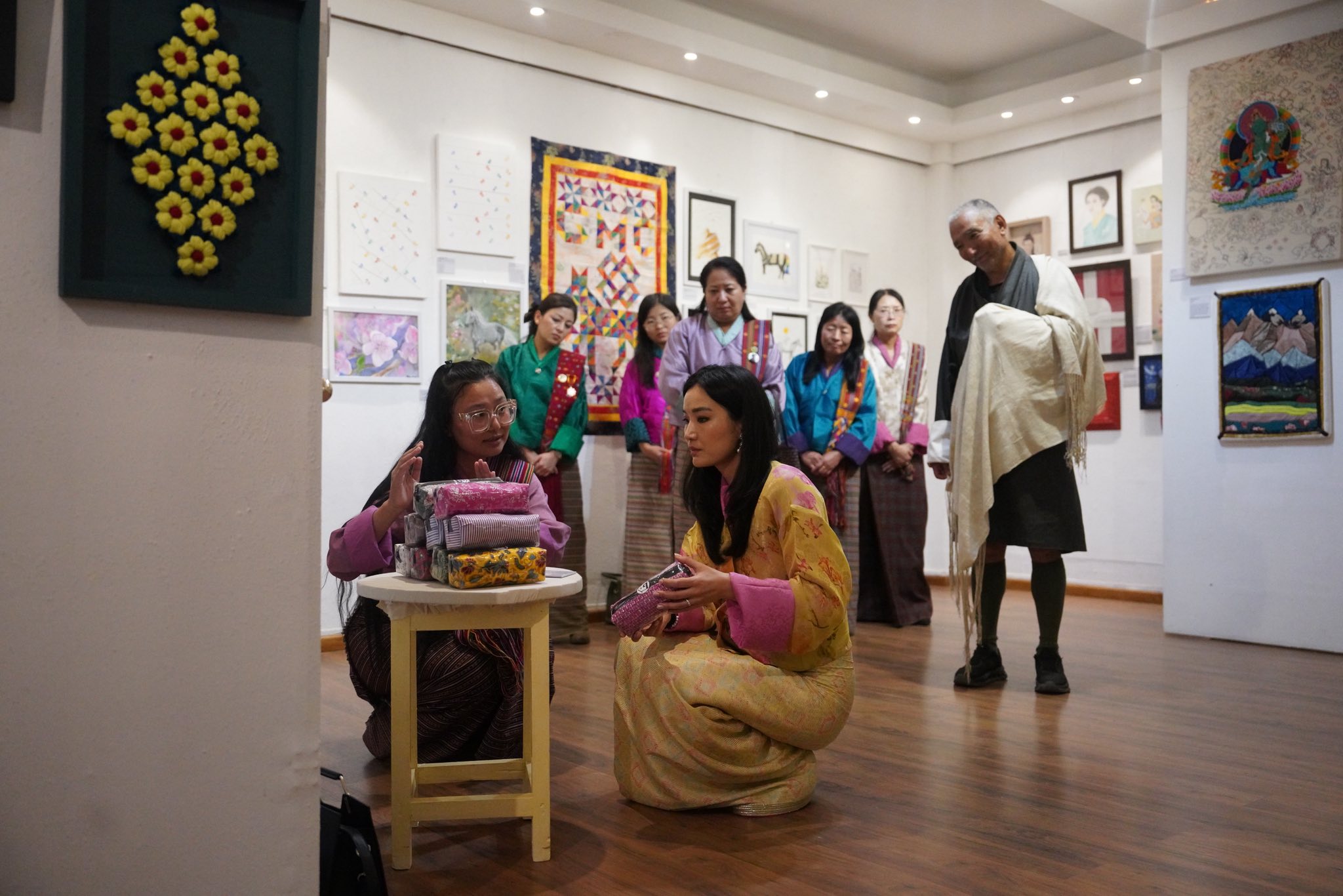 queen jetsun pema listening to artists in vast bhutan