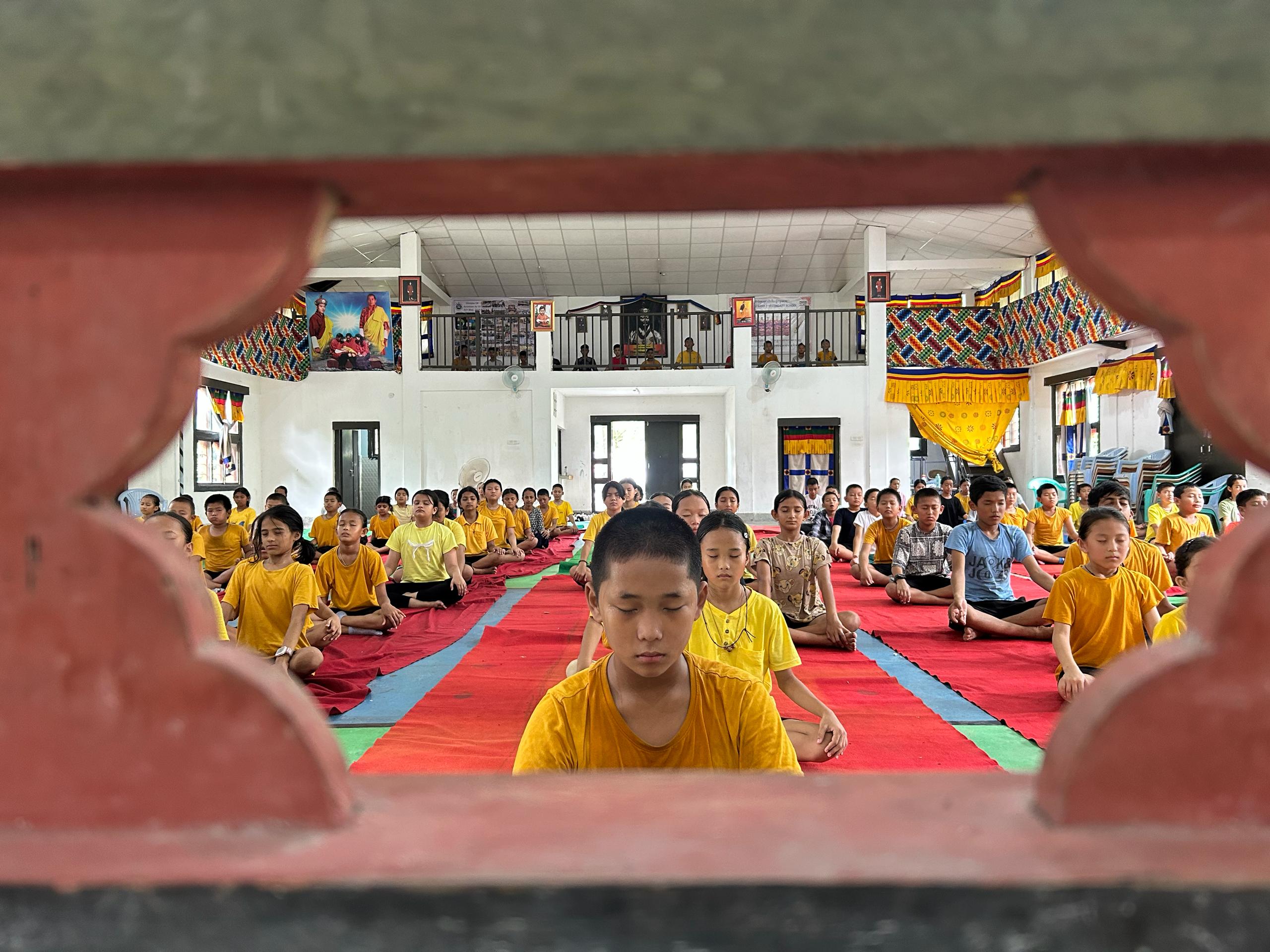 students of gelephu mss doing yoga in bhutan
