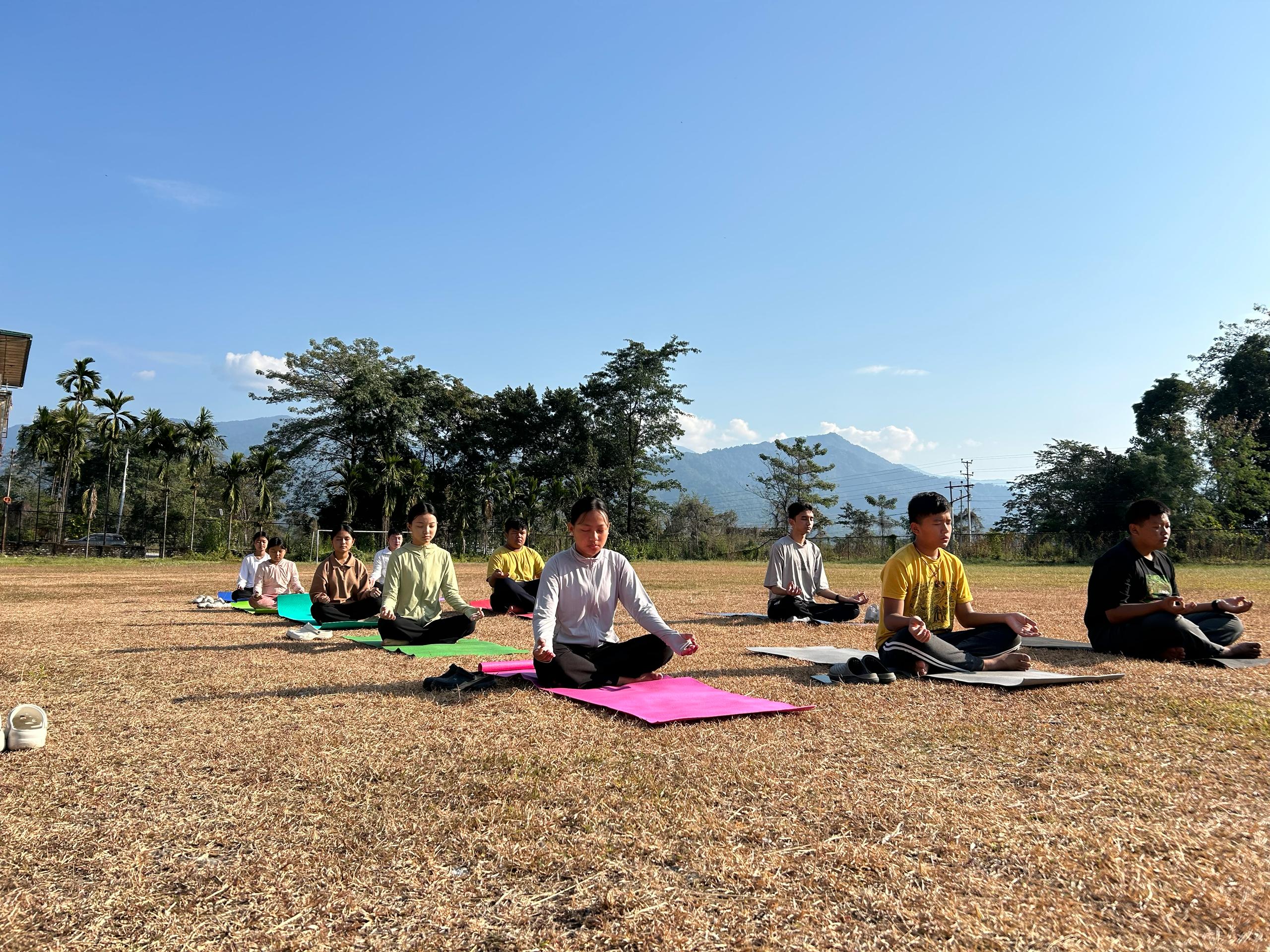 winter session students of gelephu mss doing yoga in bhutan