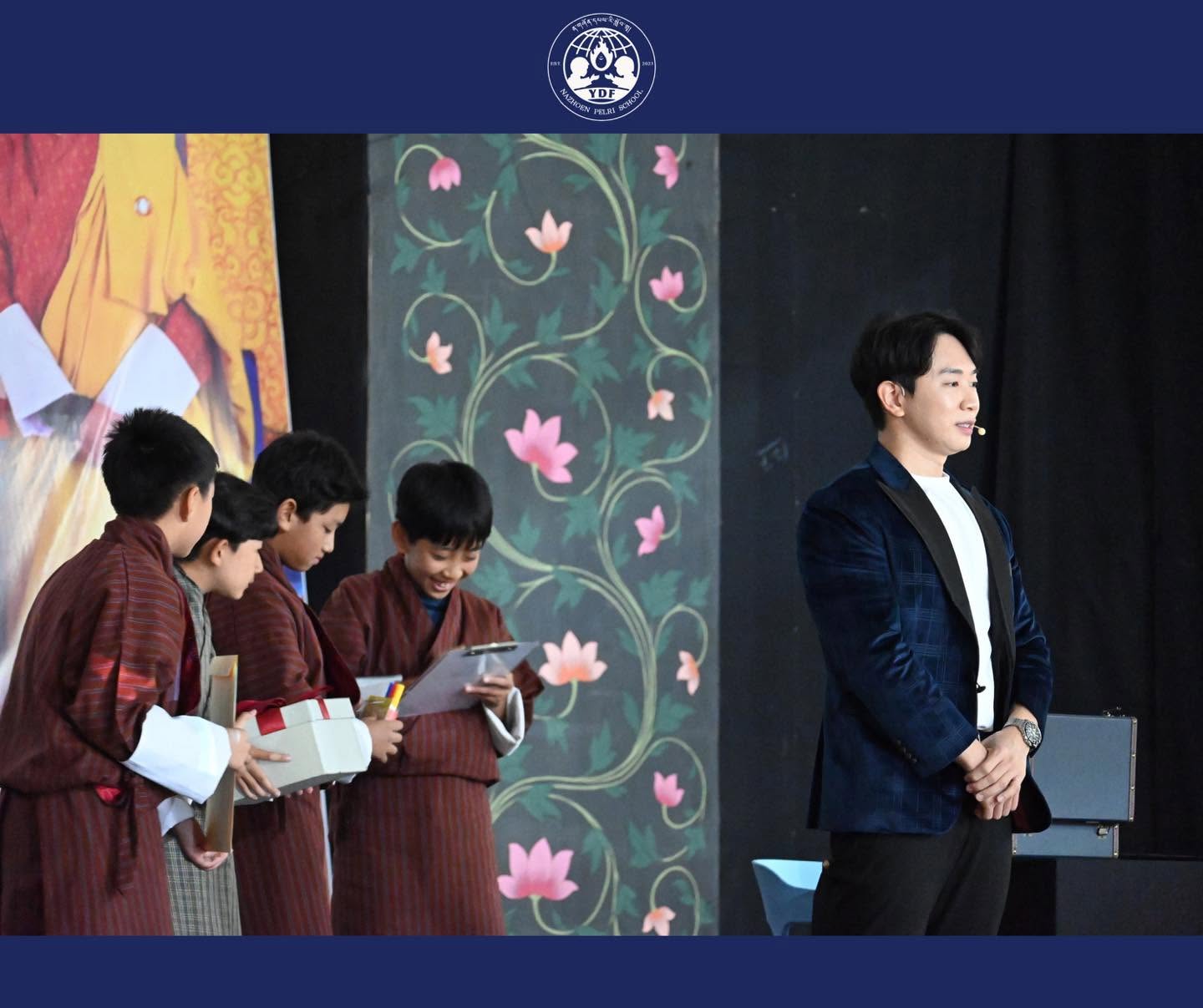 students from nazhoen pelri school bhutan with patrick kun magician