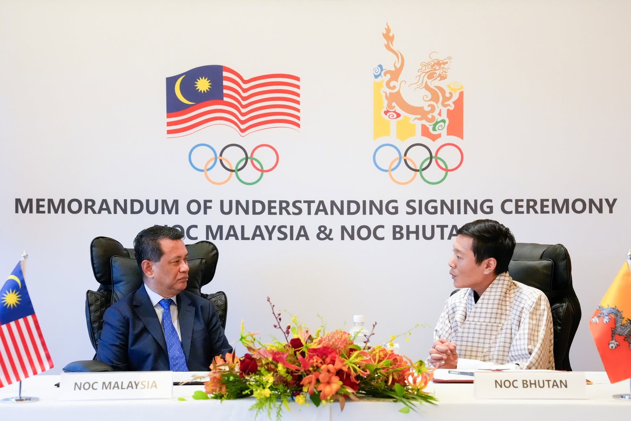 bhutan olympic committee and olympic council of malaysia signed mou in japan asian games