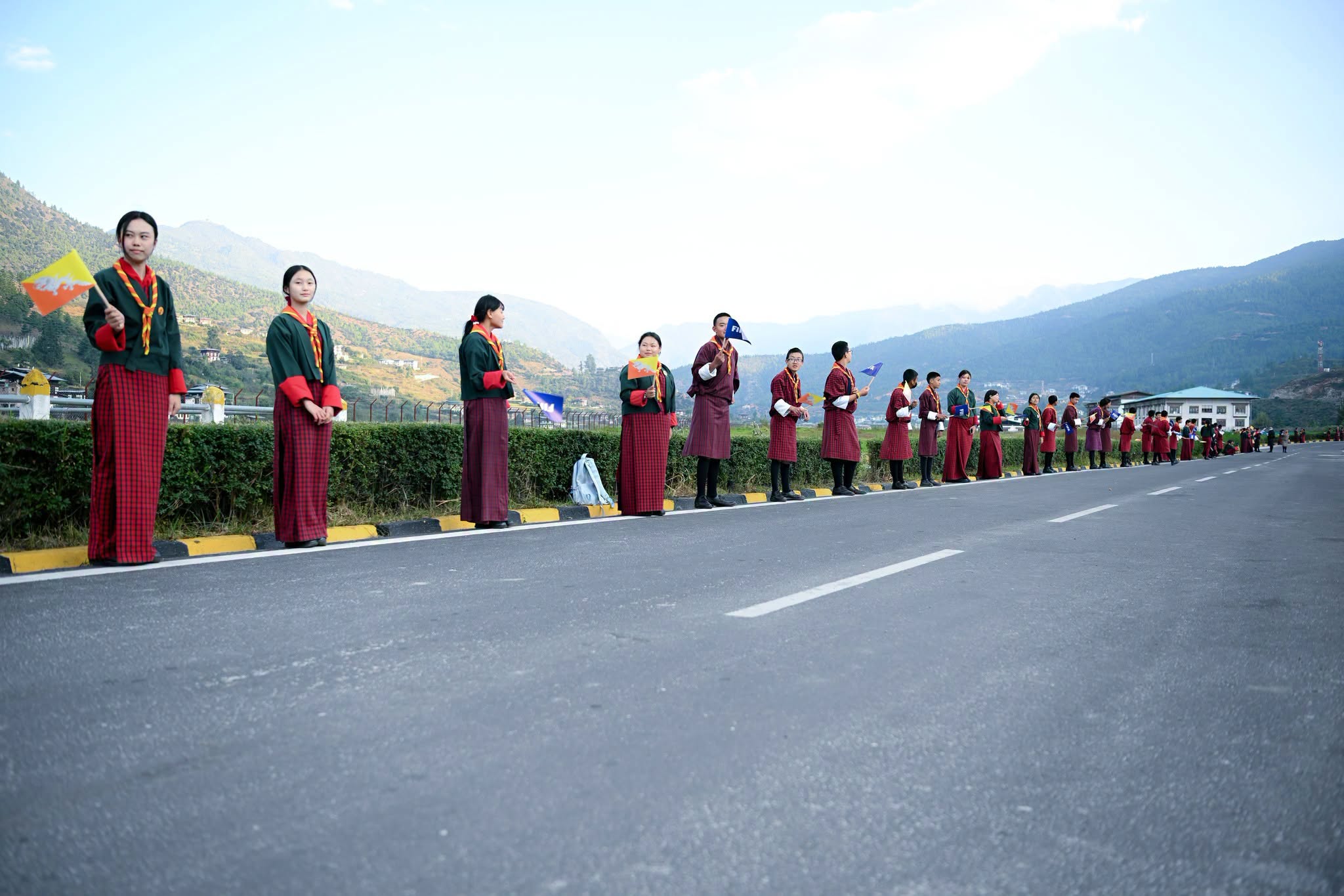 bhutanese children welcoming fifa president to bhutan